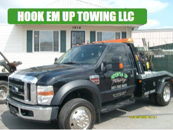 Hook 'em Up Towing,LLC logo