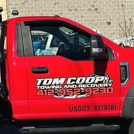 Tom Coop LLC Towing & Recovery logo
