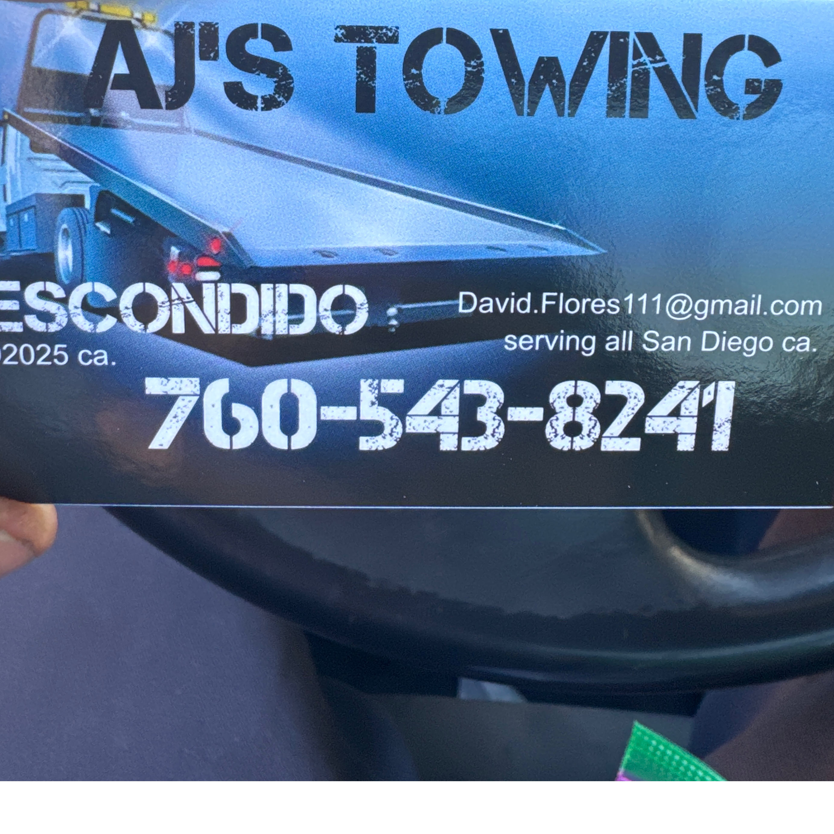 AJâ€™s Towing logo