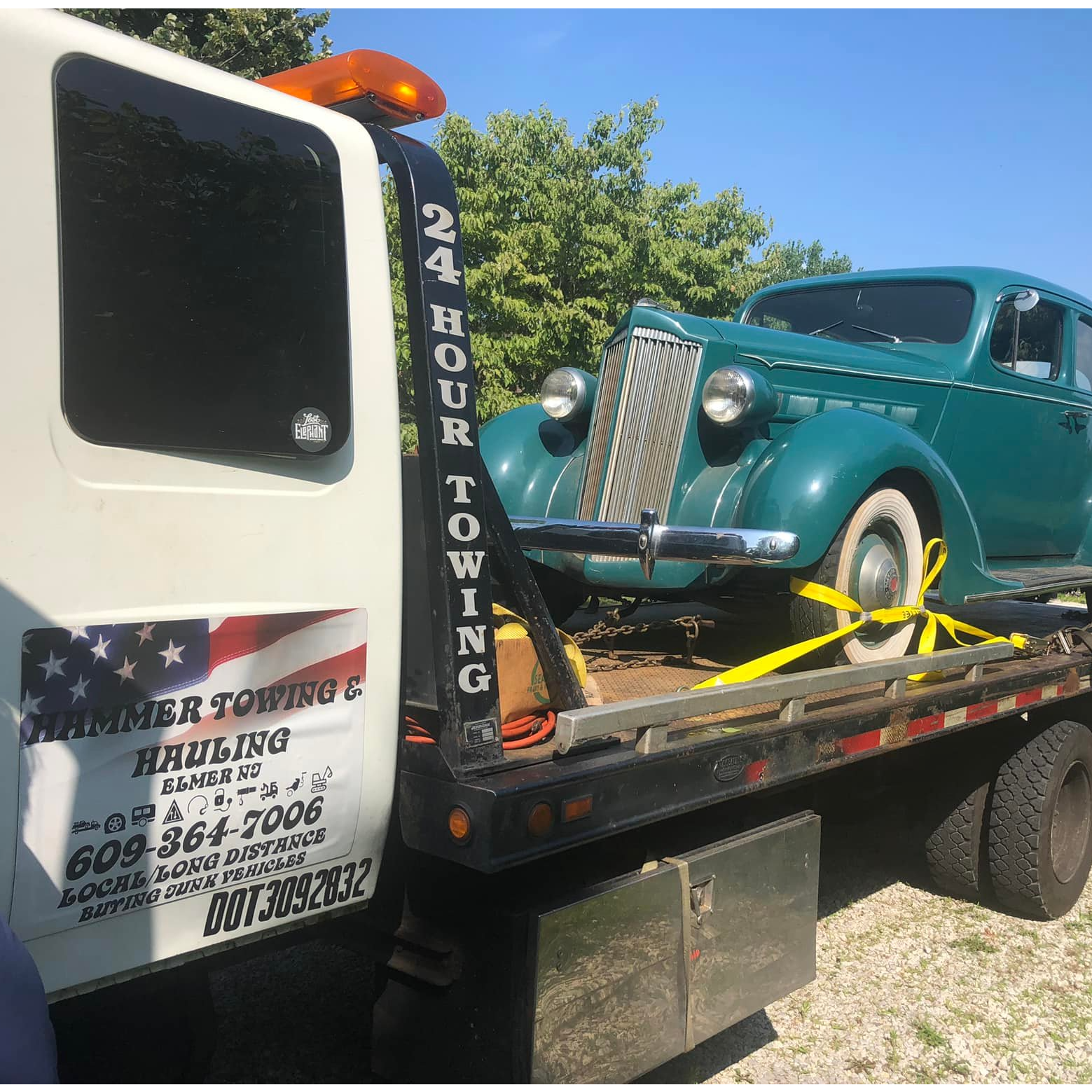 HAMMER TOWING & HAULING  logo